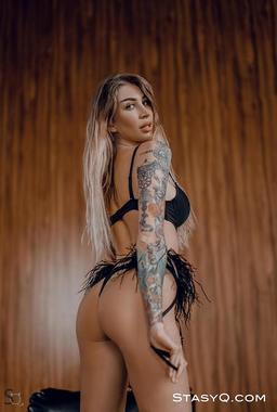 Striptease From Glamour Tattoo Model JudyQ